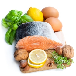 A platter of omega-3 rich foods, salmon, eggs, walnuts.